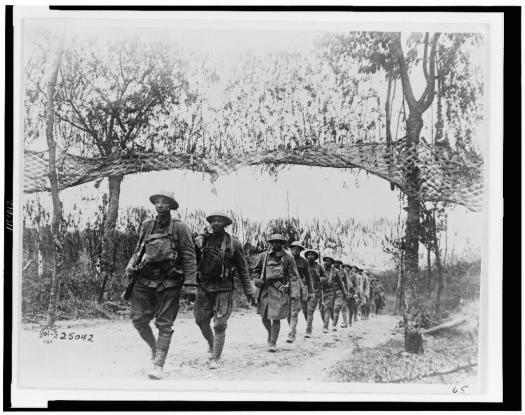 WWI U.S. Army Infantry troops, African American unit, marching northwest of Verdun, France, in World War I